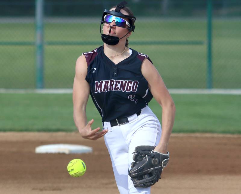 Marengo’s Jozsa Christiansen deals against Aurora Central Catholic in IHSA Class 2A Regional Title Game action softball at Marengo High School in Marengo on Friday, May 23, 2025.