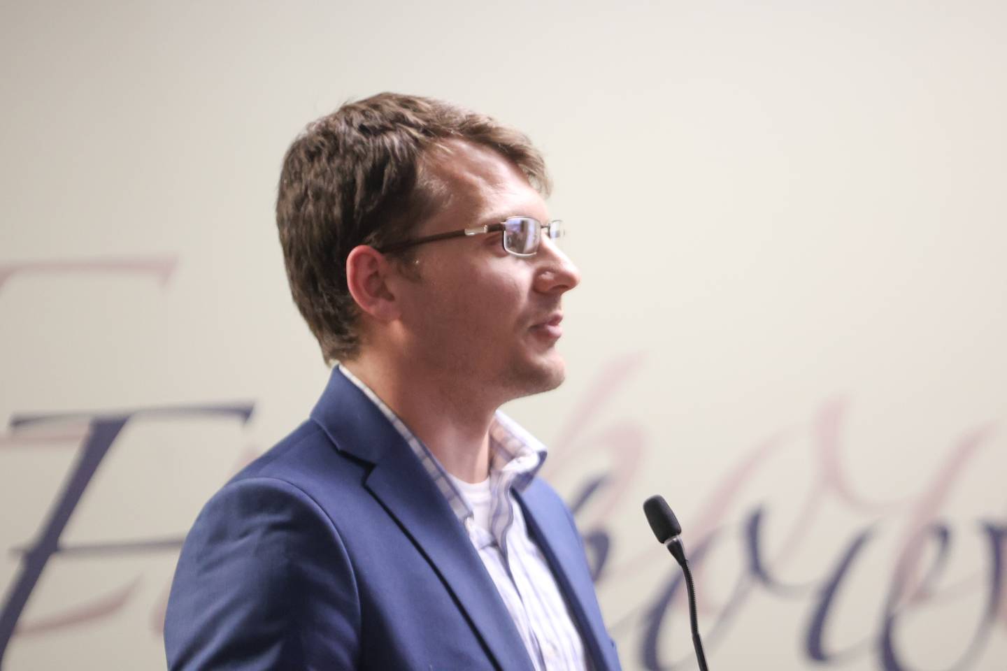 Michael Zwartz, a physics teacher at Joliet Central, speaks at the unveiling of Steel Tigers Robotics Team 4241’s robot for the upcoming FIRST Robotics Midwest Regional Competition. Wednesday, April 6, 2022, in Joliet.