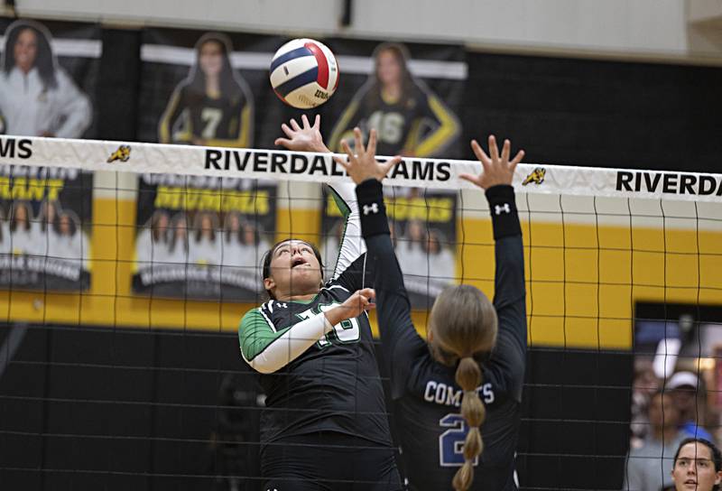 Rock Falls’ Taylor Reyna plays the ball over the net against Newman Thursday, Oct. 26, 2023 in the class 2A regional finals at Riverdale.