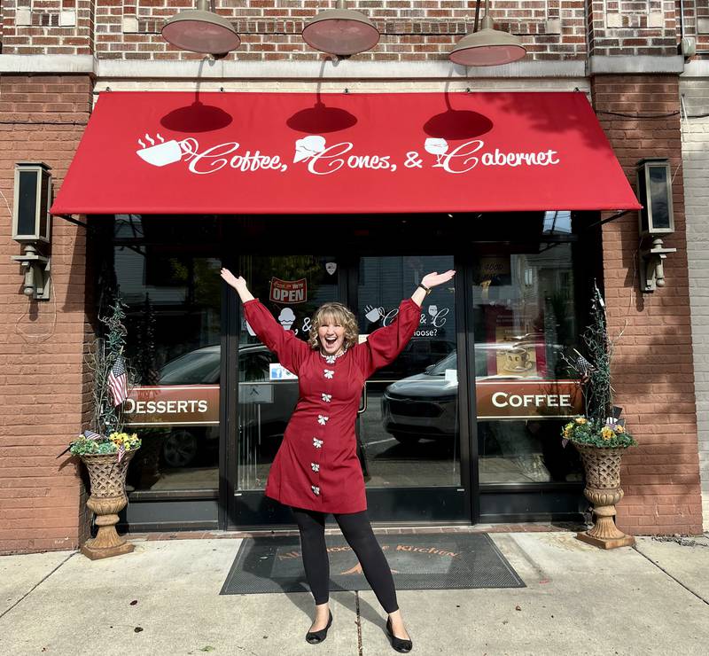 Marissa Kirch with her new business, Coffee, Cones & Cabernet at 33 S. Third St., Geneva. Kirsch bought the All Chocolate Kitchen when owners Alain and Esther Roby retired in June. Kirch said though the name has changed, staff and its offerings have stayed the same.