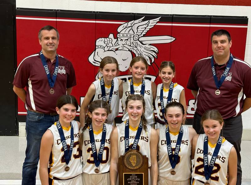 The Peru Catholic seventh grade girls basketball team placed fourth in the IESA Class 1A state tournament. Bottom (left to right): Lucy Burkart, Tegan Brandt, Beatrice Affelt, Bernadette Larsen and Emma Kenney. Top: Coach Jason Gahan, Callie Fusinetti, Liv Gahan, Ellie Giacalone and coach Chris Affelt.