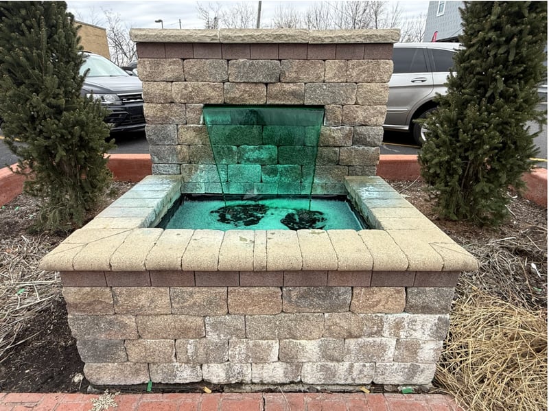 The fountain at First and Gooding Streets dyed green in honor of the Irish diggers of the I&M Canal.