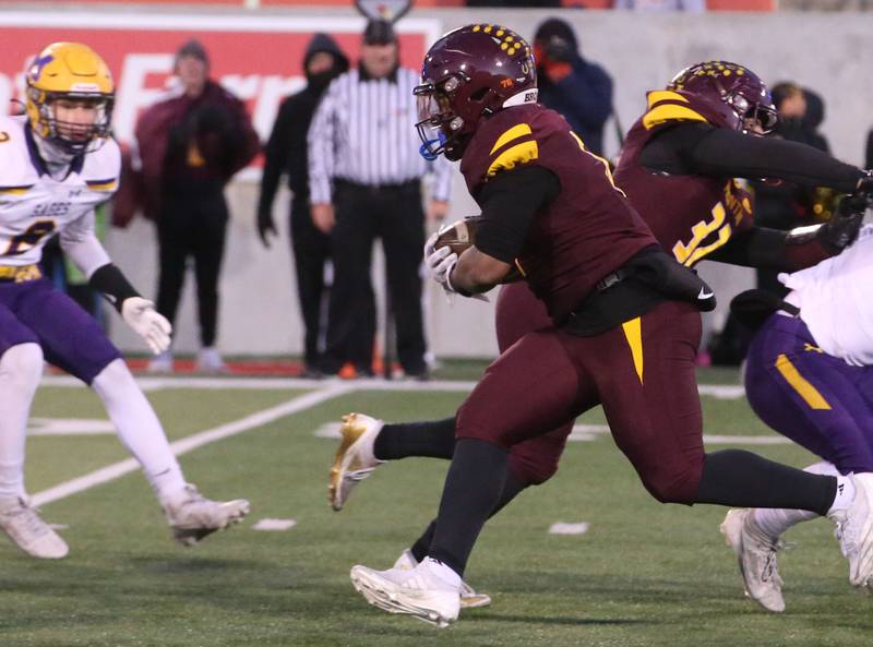 Montini Catholic's Jeremiah Peterson runs the ball against Monticello during the Class 3A State football championship on Friday, Nov. 29, 2024 at Hancock Stadium in Normal.