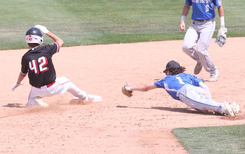 Henry-Senachwine's Carson Rowe slides back into second base while Newman's Garrett Matznick misses to tag him during the Class 1A State semifinal game on Friday, June 2, 2023 at Dozer Park in Peoria.