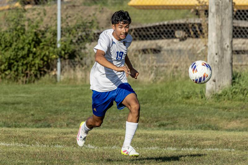 Joliet Central's Carlos Esparza runs towards the ball during a varsity soccer game against Joliet Catholic at Joliet Catholic on Sept. 8, 2025.