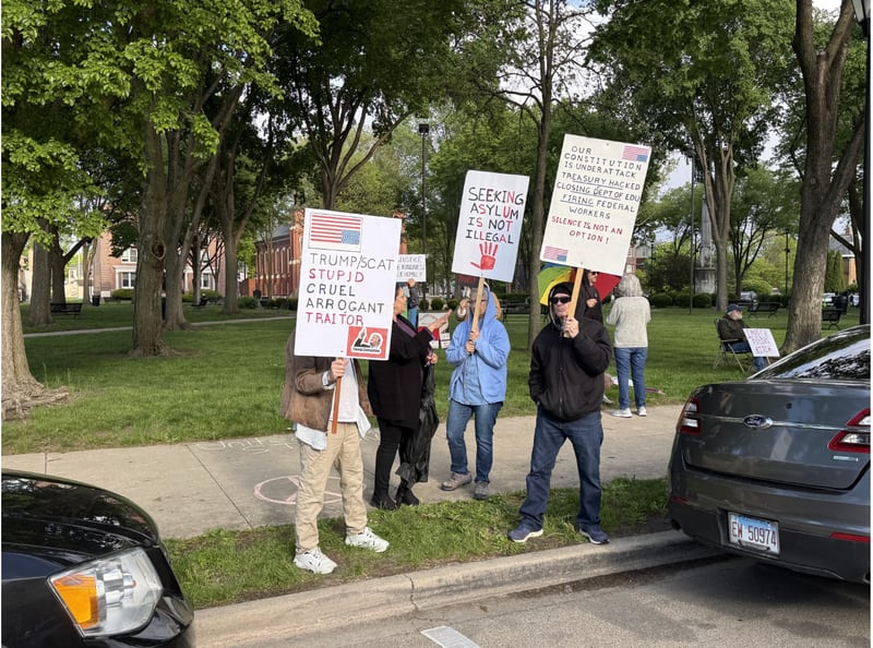 Protestors gathered as part of a nationwide "May Day Rally" on Friday, May 1 at Washington Square Park in Ottawa.