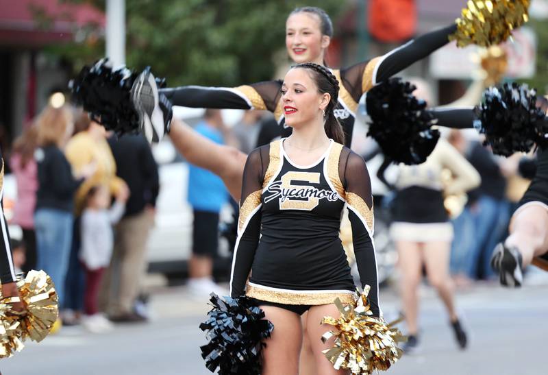 The Sycamore High School Dance Team makes its way through downtown Sycamore Wednesday, Oct. 5, 2022, during the school's homecoming parade.