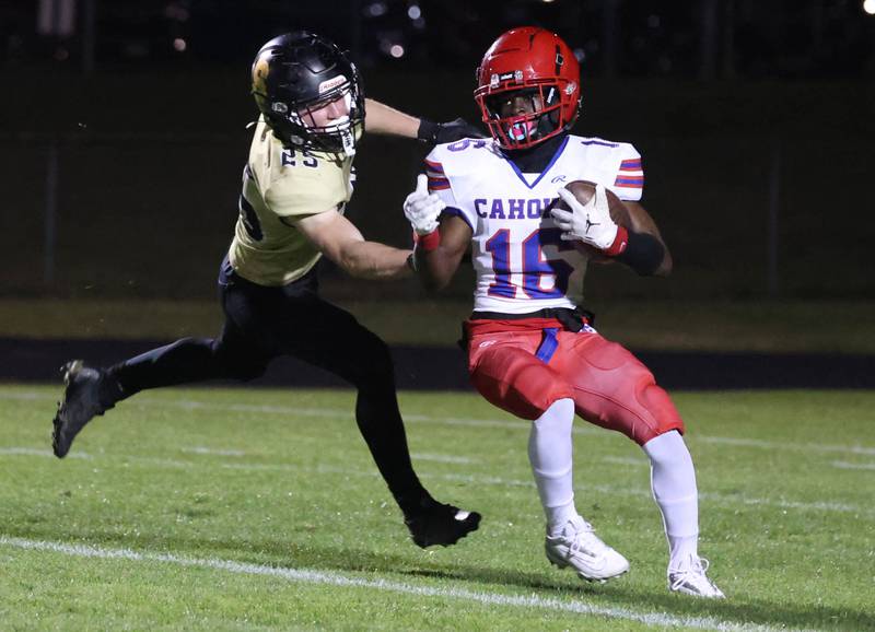 Sycamore's Kevin Lee brings down Cahokia's Orlando Fridge during their game Friday, Oct. 25, 2024, at Sycamore High School.