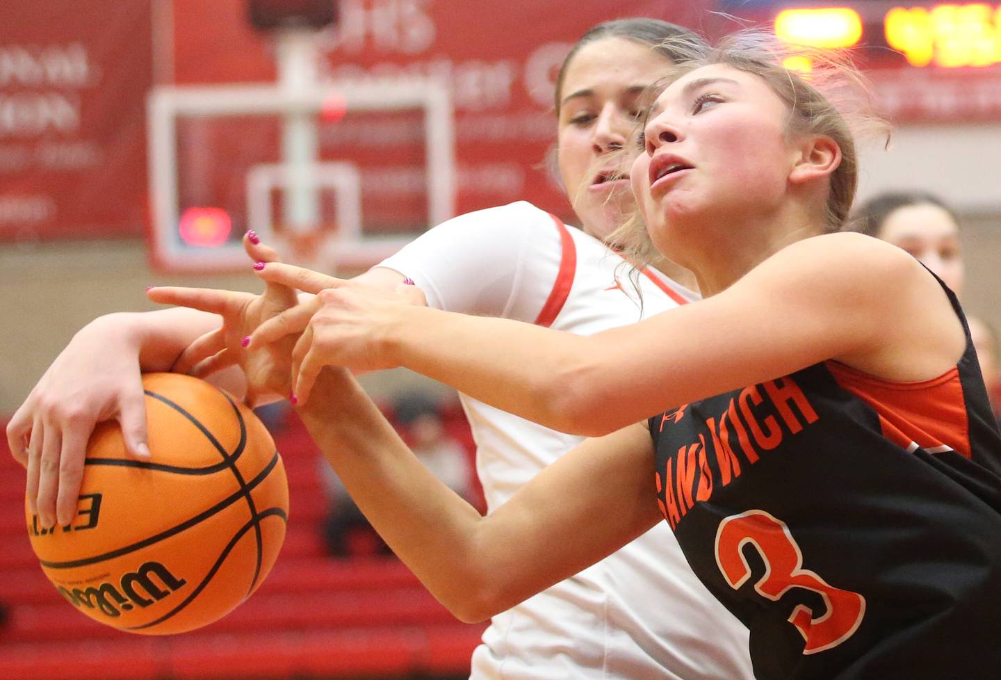 Ottawa's Marlie Orlandi steals the ball from Sandwich's Alee Subat on Monday, Jan. 27, 2025 in Kingman Gym at Ottawa High School.