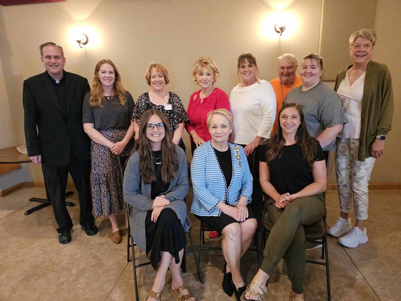 Pictured (back, from left) are the REv. Monsignor James Kruse and Jessica Murphy with Magi Baby Chest - St. Louis Parish Princeton; Vanessa Hoffeditz with Tri-County Opportunities Council (Bureau County Food Pantry); Sue Stutzke with Princeton DAR; Kathy Barker with Barker Farm Outreach Inc; Gary Monier and Briana Butler with Bureau County Fair; and Joanne Sheldon, Chair of our Fundraising Committee; (seated, left to right) Erin Rosenthal with The Store; Nancy Gartner with Princeton DAR; and Lauren Widmer with Zearing Child Enrichment Center Inc.
