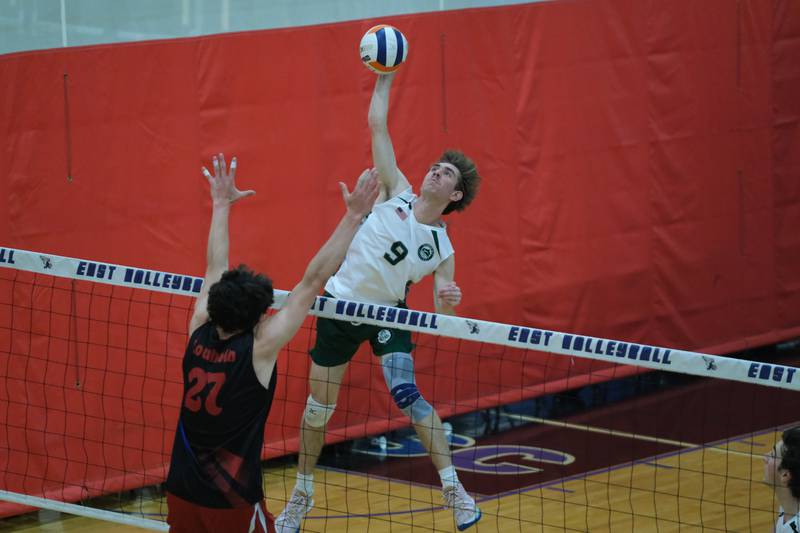Glenbard West’s Gavin Swartz goes for the kill against Roncalli (IN) in the Lincoln-Way East Tournament title match. Saturday, April 30, 2022, in Frankfort.