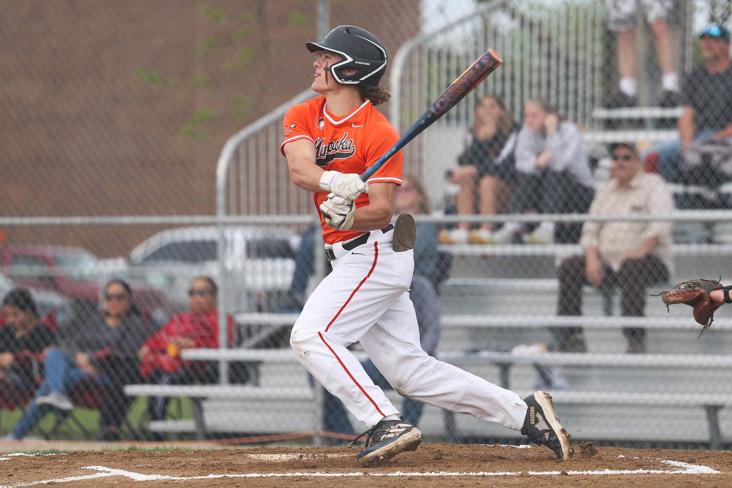Minooka’s Nate George drives in a run against Plainfield North on Thursday, May 2, 2024 in Minooka.
