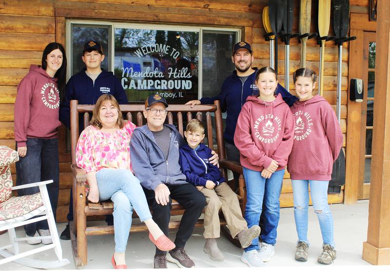 Three generations of the Rogers Family have enjoyed being at Mendota Hills Campground since owners Mark and Susan Rogers (seated) started camping there with their children in 1985. The Rogers' took ownership of the Amboy campground in 2002, and their son Jamie (third from right) and his wife Jessica (left) now are involved in ownership. Jamie and Jessica's children, Sawyer, Oliver, Shiloh and Eden are taking in experiences that their father enjoyed as a kid decades ago.