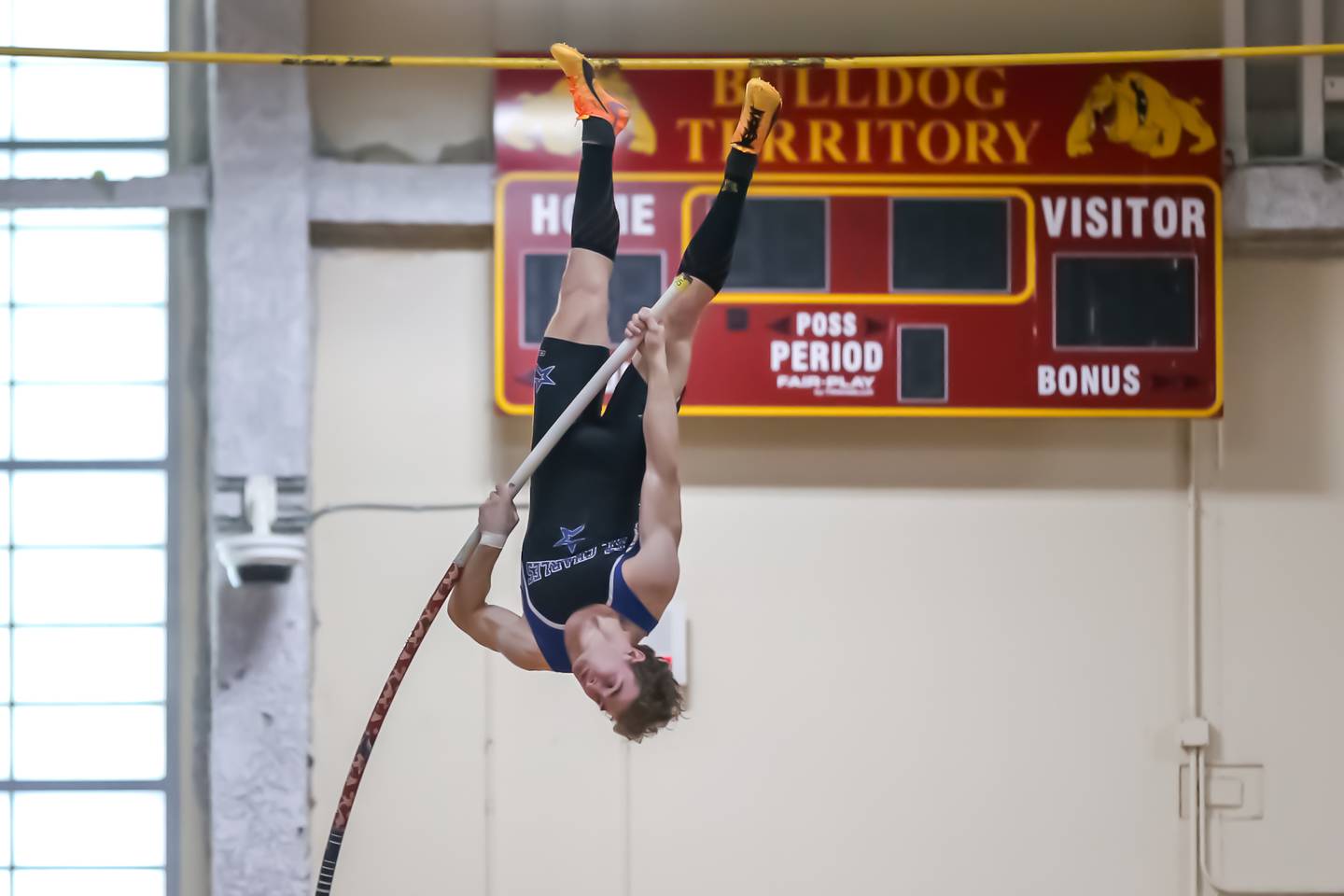 St Charles North's Nathan McLoughlin performs in the pole vault during DuKane Boys Indoor Track and Field Conference Championships. Mar 16, 2024