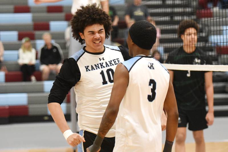 Kankakee's Aidan Lidell, left, celebrates with Jamon Barlow after a point late in the second set of the Kays' 2-0 win over Bishop McNamara at home Tuesday, March 31, 2026.