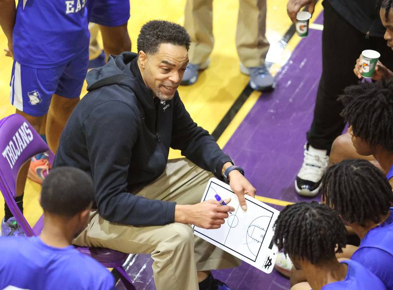 Proviso East coach Donnie Boyce talks to the team during the boys 4A varsity regional final between Downers Grove North and Proviso East in Downers Groves on Friday, Feb. 24, 2023.
