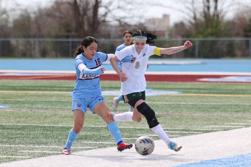 Kankakee's Liana Tapia and Bishop McNamara's Isabelle Kuntz battle for possession during the Kays' 8-0 victory in the final All-City match on Saturday, April 11, 2026.Kankakee's Liana Tapia and Bishop McNamara's Isabelle Kuntz battle for possession during the Kays' 8-0 victory in the final All-City match on Saturday, April 11, 2026.