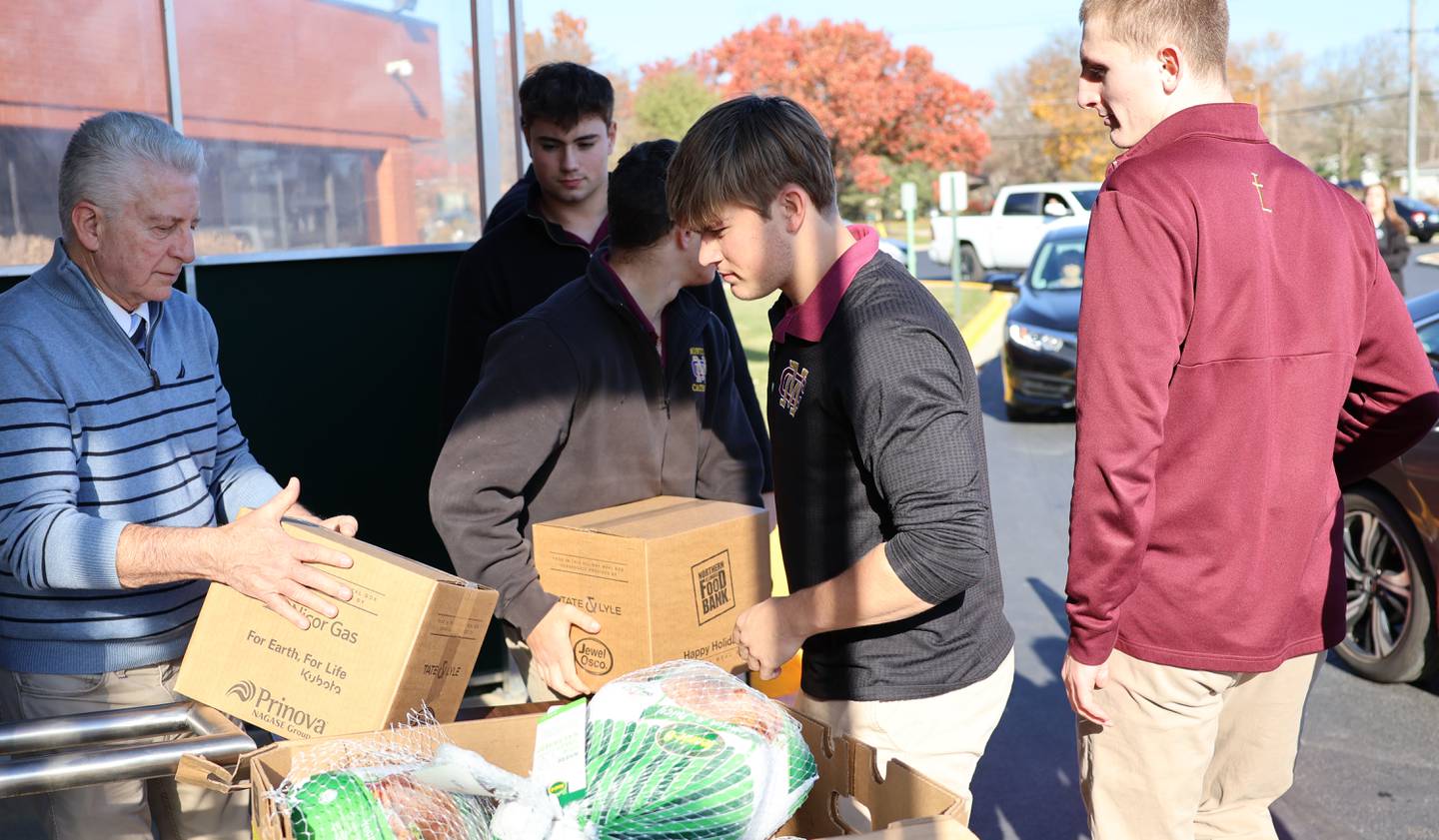 Montini Catholic students volunteering at the York Township's annual turkey give-away