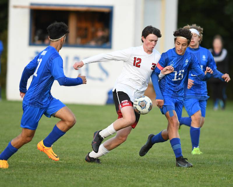 Indian Creek's Jacob McNally, 12, tries to control the ball during the first half of the game while being defended by Hinckley-Big Rock's Sawyer Smith, 15, on Monday Sept. 26th while at Hinckley-Big Rock High School