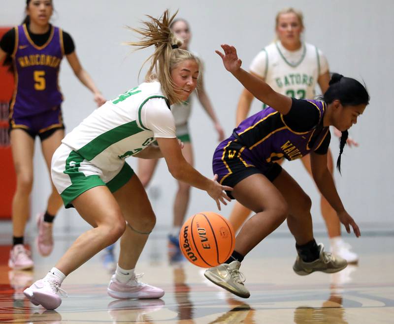 Crystal Lake South's Gracey LePage steals th ebvall from Wauconda's Alexia Manalo during the Northern Illinois Holiday Classic Championship girl basketball game on Thursday, Dec. 18, 2025, at McHenry High School.