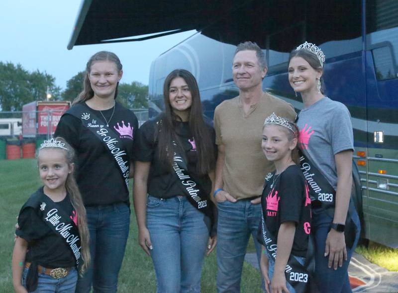 Craig Morgan poses with the Marshall-Putnam Fair royalty  during the 102nd Marshall-Putnam Fair county concert on Thursday, July 13, 2023 in Henry.