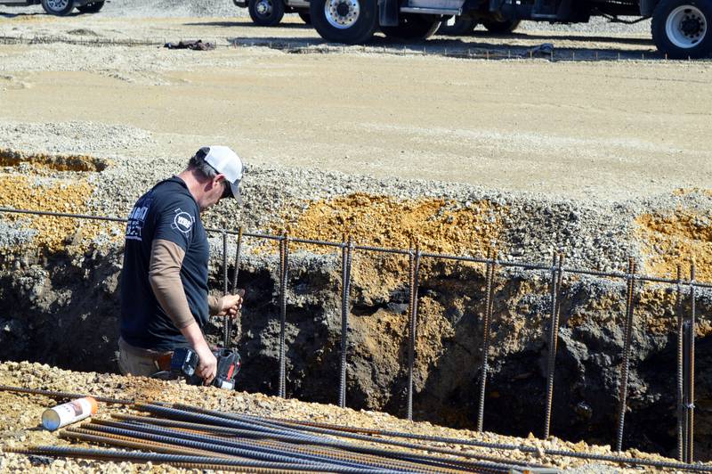 A worker from M & M Concrete Inc. works on the start of the new city of Polo and Buffalo Township joint municipal building on Wednesday, March 6, 2024. The $1.93 million building will be located at 118 N. Franklin Ave.