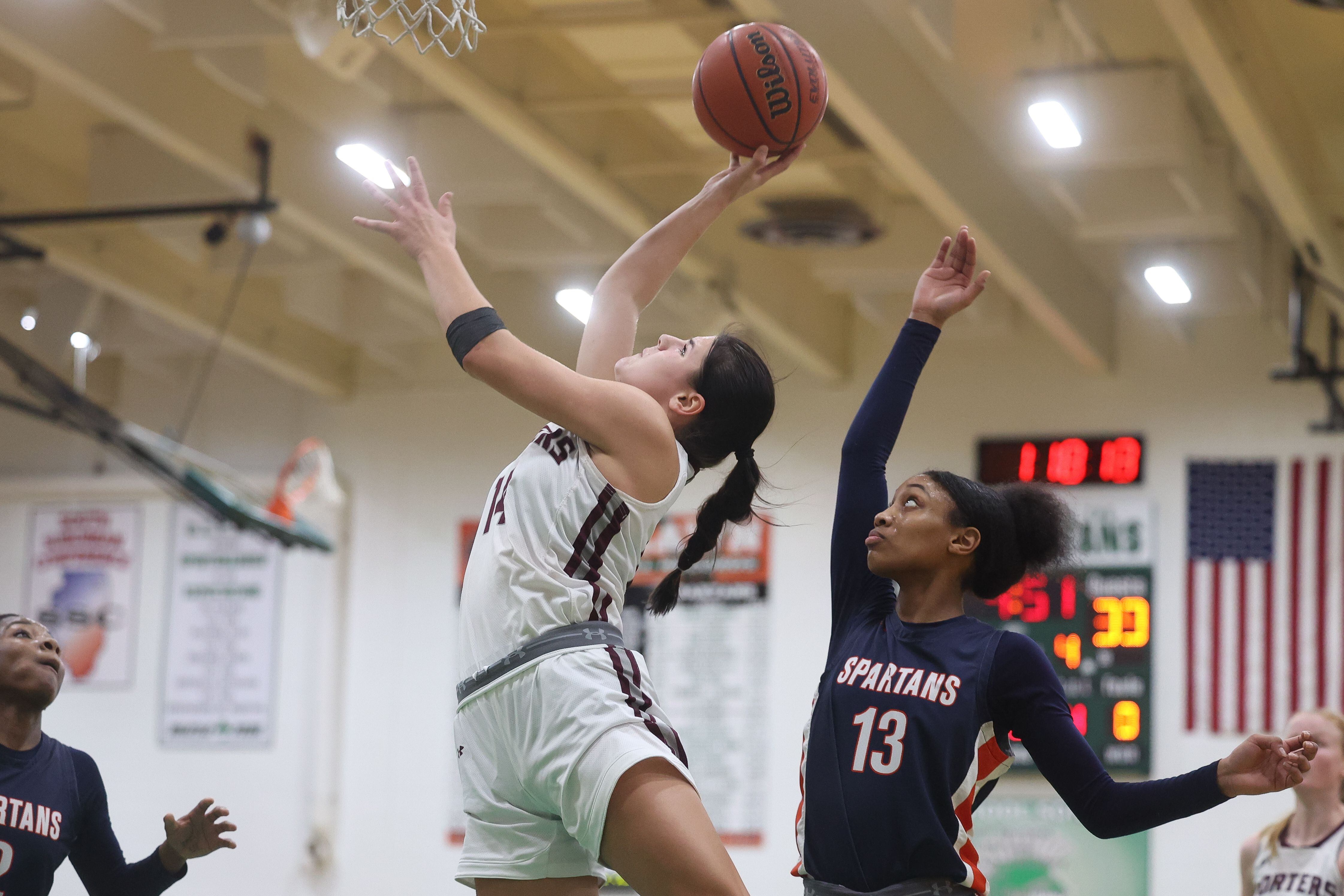 Lockport’s Veronica Bafia arcs for the shot against Romeoville in the Oak Lawn Holiday Tournament championship on Saturday, Dec.16th in Oak Lawn.