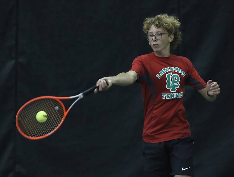 LaSalle’s Andrew Bollis returns the ball during a IHSA 1A boys double tennis match Thursday, May 26, 2022, at Midtown Athletic Club in Palatine.