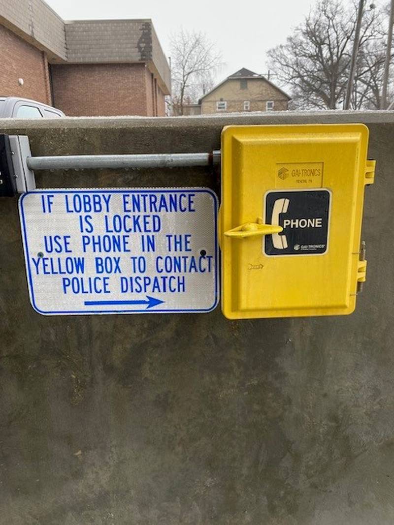 If lobby entrance is locked at the Streator police station, use the phone in the yellow box to contact police dispatch.
