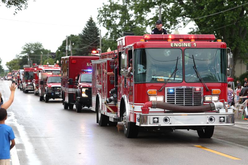 Several local fire departments apparatuses head down Main Street Friday, July 4, 2025,during the Fourth of July parade in downtown Kirkland.