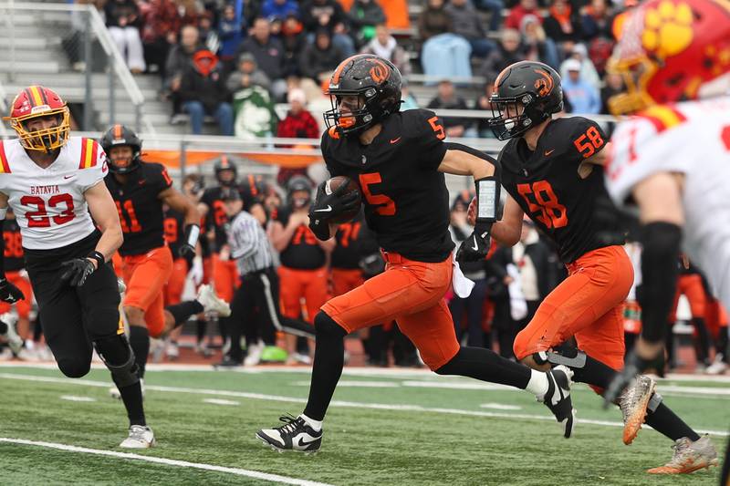 Lincoln-Way West’s Chase Markowicz breaks through the second level for a catch and run touchdown against Batavia on Saturday, Nov. 9, 2024 in New Lenox.