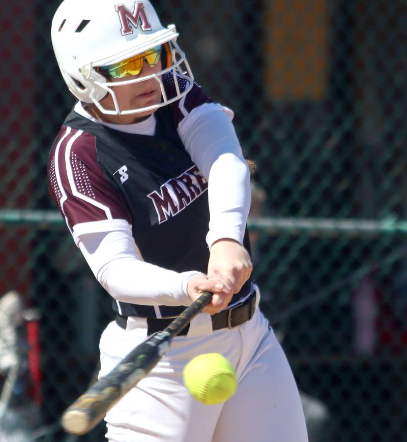 Marengo’s  AJ Pollnow connects for a grand slam against North Boone in varsity softball at Marengo High School in Marengo on Saturday, March 22, 2025.
