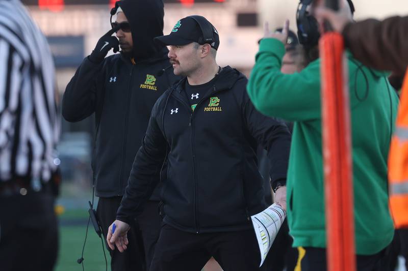 Providence head coach Tyler Plantz walks the sidelines against Joliet Catholic in the Class 5A semifinal on Saturday, Nov. 18, 2023, in Joliet.