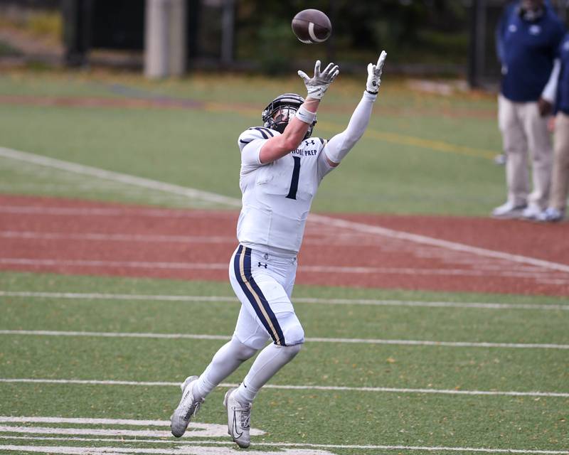 IC Catholic Prep's Will Schmidt (1) catches a pass and runs in for a touchdown during the 3A Playoff game against Chicago Hope Academy on Saturday Nov. 1, 2025, held at Altgeld Park in Chicago.