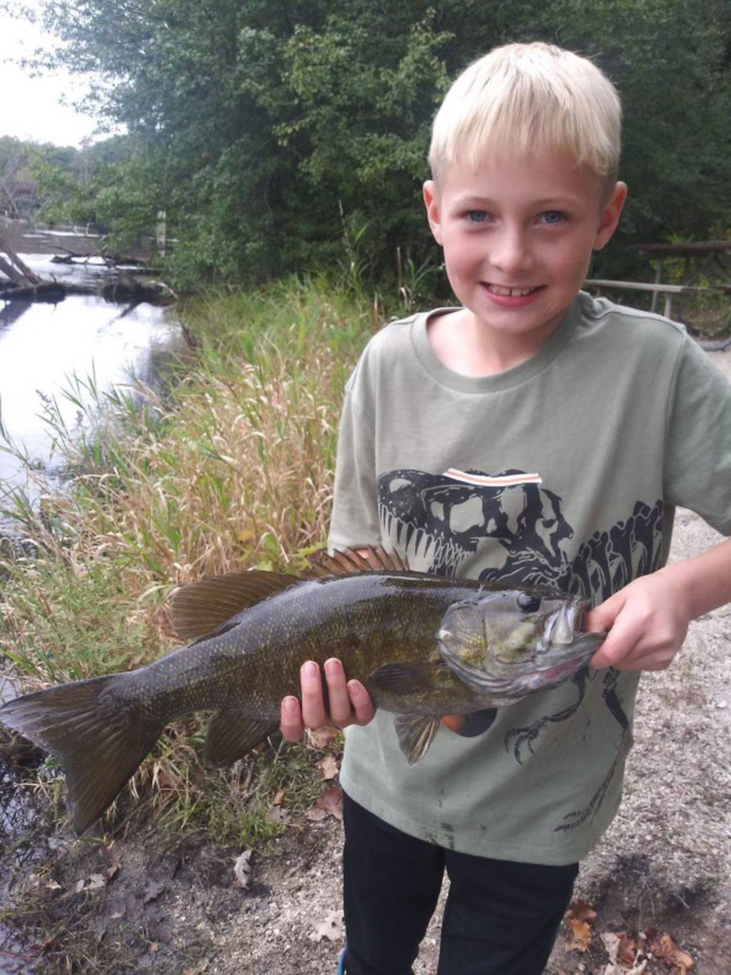 Alan Kroll holds up a fish in an undated photo.
