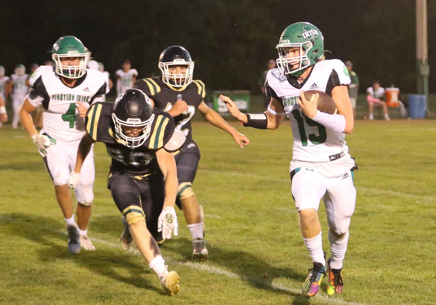 Seneca quarterback Paxton Giertz runs the ball against St. Bede earlier this season at St. Bede Academy.