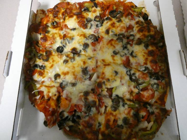 "Sal's Favorite" specialty pizza from Sal's Pizza Company in Algonquin includes an impressive supply of pepperoni, black olives, onions, tomatoes, green peppers, and bubbly mozzarella cheese.
