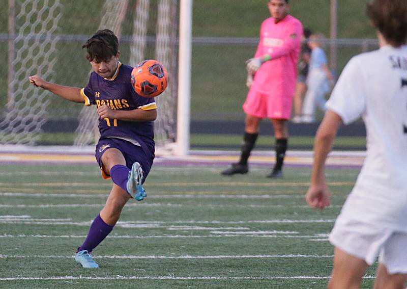 Mendota's Mauricio Martinez (17) kicks the ball down the field against Bloomington Central Catholic on Wednesday, Sept. 14, 2022 in Mendota.