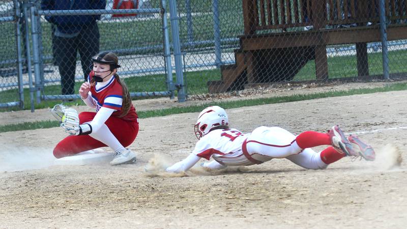 Morrison third baseman Ava Duncan gets ready to try and tag Oregon's Ella Dannhorn as she steals third on Saturday, May 17, 2025 at Oregon Park West.
