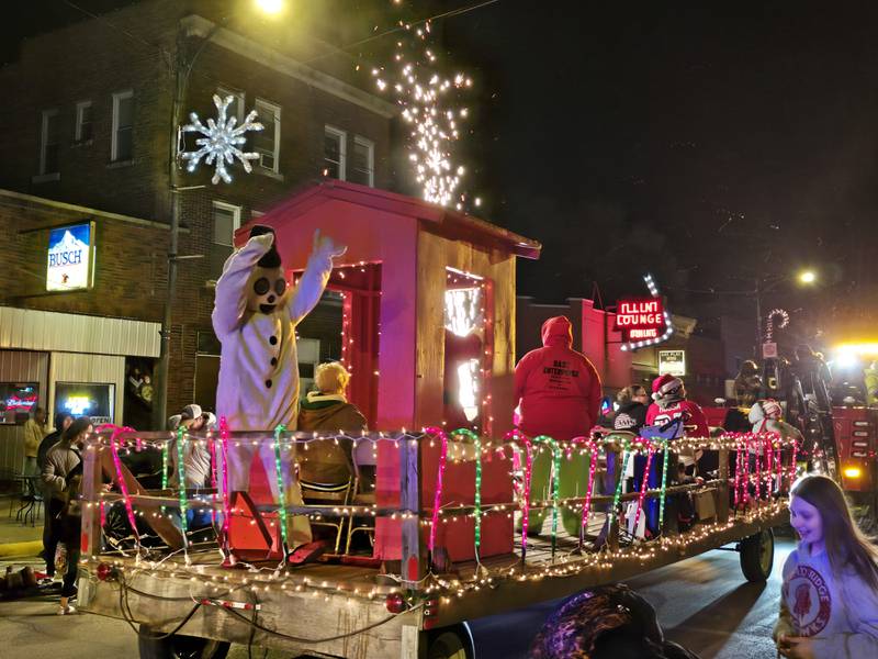 Frosty the Snowman is accompanied by pyrotechnics to conclude the Holiday Magic Lighted Santa Parade on Saturday, Dec. 7, 2024, in Marseilles
