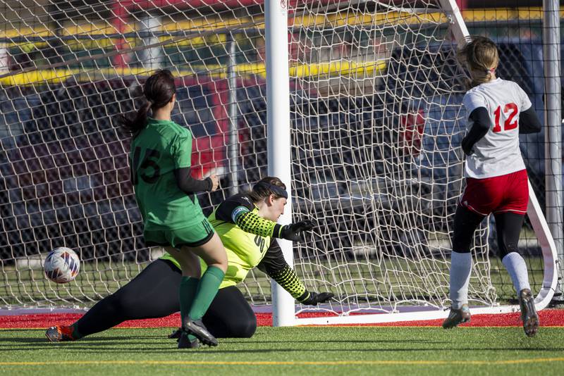 Chloe Carmona of Ottawa High School scores a goal against LaSalle-Peru High School during the match on April 10, 2025 at the LaSalle-Peru Sports Complex.