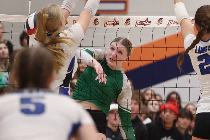 Providence’s Abbey Knight powers a shot for a point against Limestone in the Class 3A Pontiac Supersectional on Monday, Nov. 11, 2024 in Pontiac.