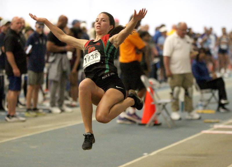 LaSalle-Peru's Emily Strehl flies through an attempt the 2A triple jump finals during the IHSA Girls State Championships in Charleston on Saturday, May 21, 2022.