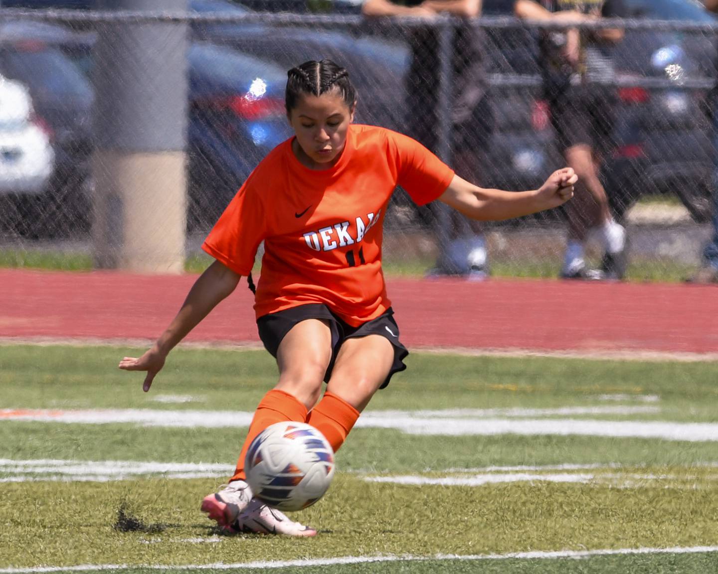 DeKalb’s Ashley Hernandez (11) kicks the ball down the field during the game on Saturday May 10, 2025, while taking on Sycamore held at DeKalb High School.