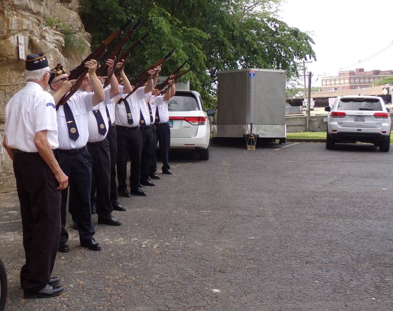 A 21-gun salute is presented by the Marseilles Honor Guard on Monday, May 29, 2023, during a Memorial Dedication Ceremony.