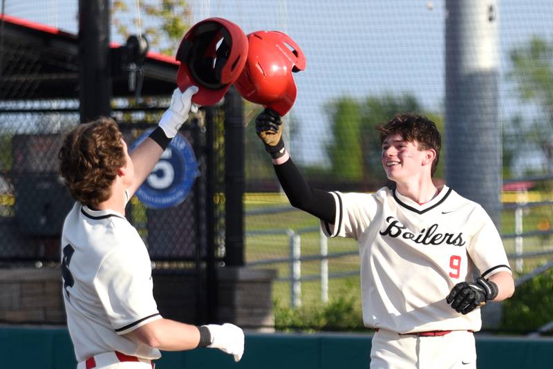 Bradley-Bourbonnais' Keaton Allison, right, congratulates Eric Rainbolt after Rainbolt's home run during a home game against Stagg Friday, May 8, 2026.