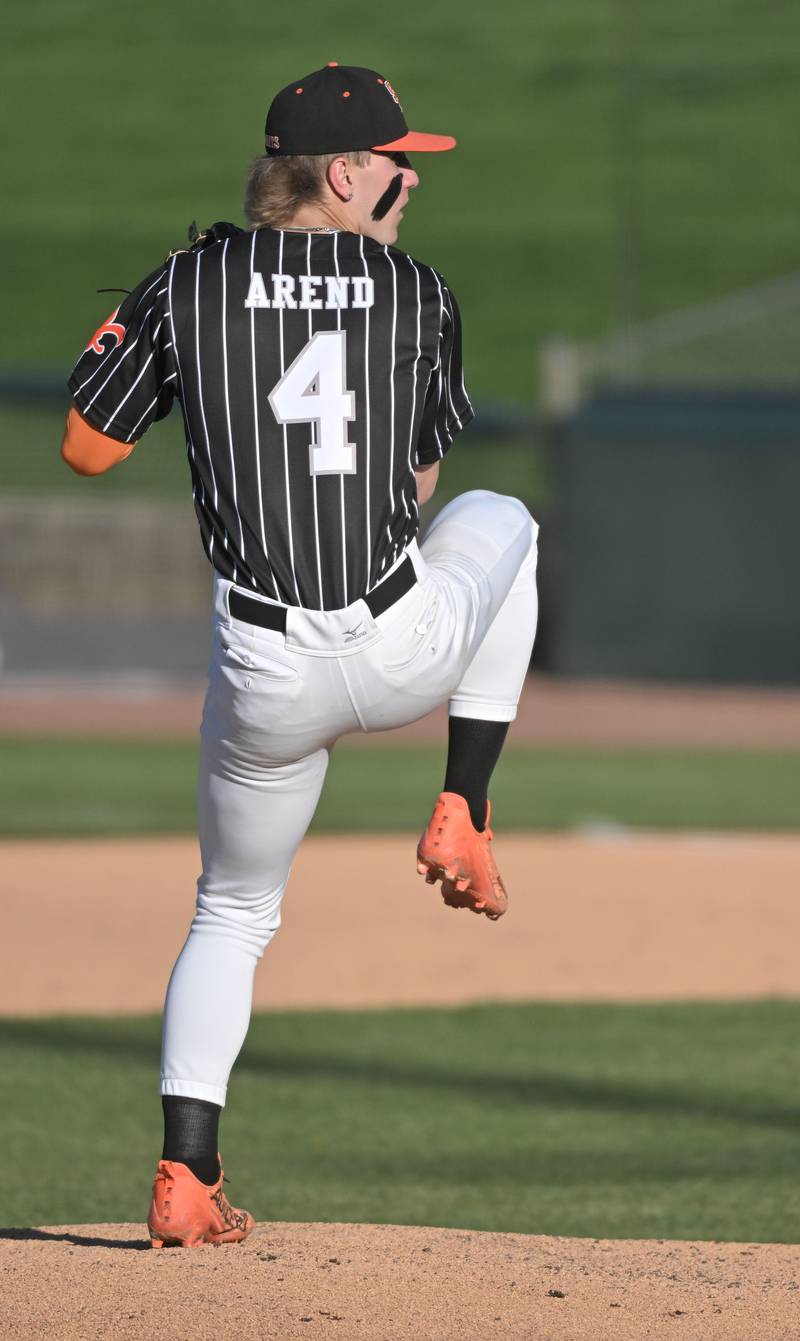 St. Charles East pitcher Joey Arend throws against St. Charles North in the third game of their inter-city series at Northwestern Medicine Field in Genenva on Tuesday, April 20, 2024.