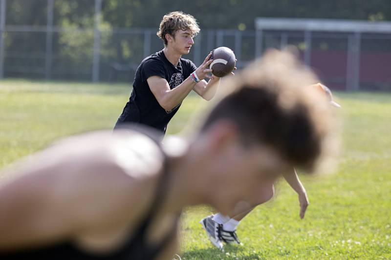 The Morrison football team goes through workouts during a camp Tuesday, July 25, 2023. The Mustangs will open their season against Mendota at the end of August.