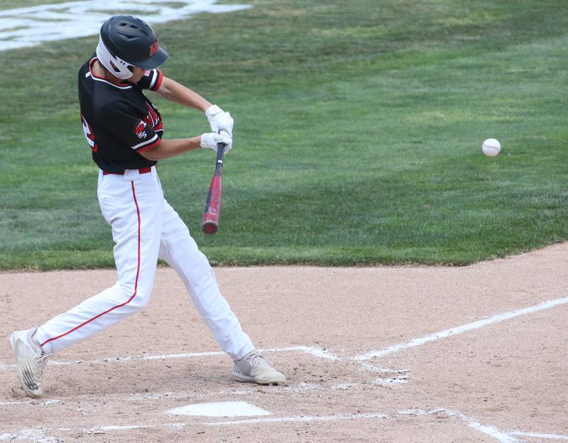 Henry-Senachwine's Colton Williams gets a hit against Newman during the Class 1A State semifinal game on Friday, June 2, 2023 at Dozer Park in Peoria.