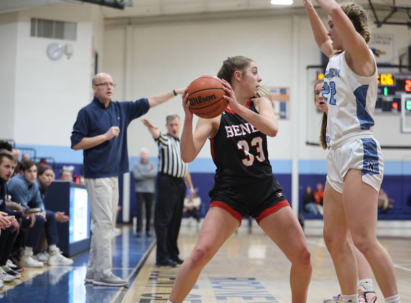 Benet's Magdalena Sularski (33) is trapped by Nazareth's Gracie Carstensen (22) during the girls varsity basketball game between Benet and Nazareth academies on Wednesday, Jan. 3, 2023 in La Grange Park, IL.